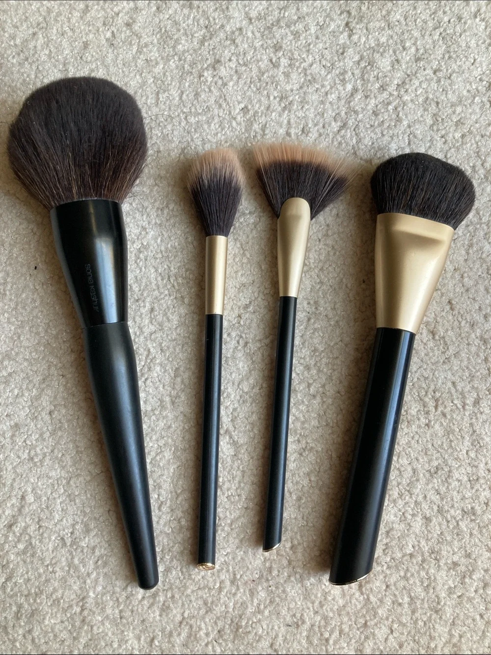 Assorted set of used 11 makeup brushes including Sephora, sonia kashuk and elf